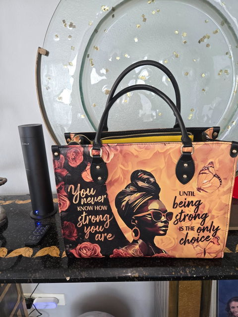 Customer photo from Lauren G's review of /products/siyanda-leather-handbag