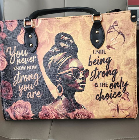 Customer photo from Moni B's review of /products/siyanda-leather-handbag