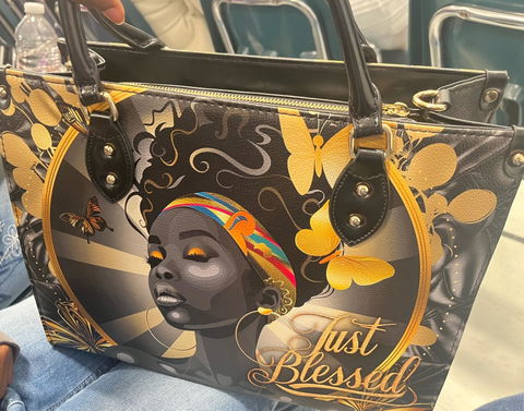 Customer photo from MM's review of /products/imani-blue-orchid-leather-handbag