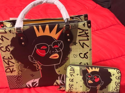 Customer photo: the crowned-woman handbag and its matching wallet on a red coat