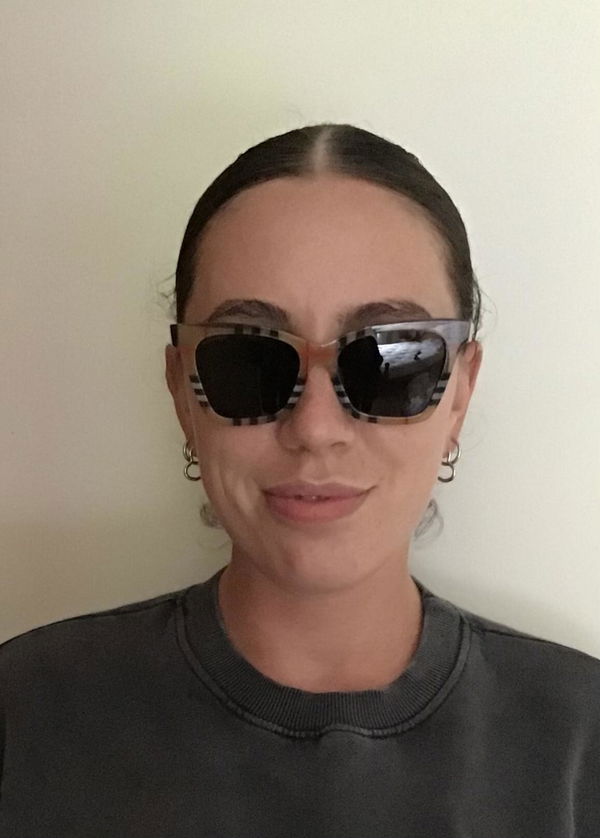 Woman wearing Burberry sunglasses