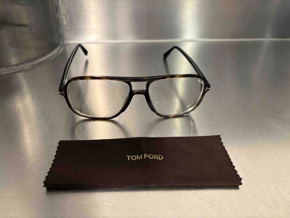 Tom Ford glasses with cloth