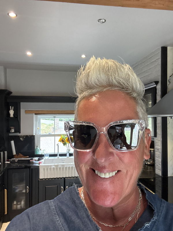 Woman wearing Jimmy Choo sunglasses