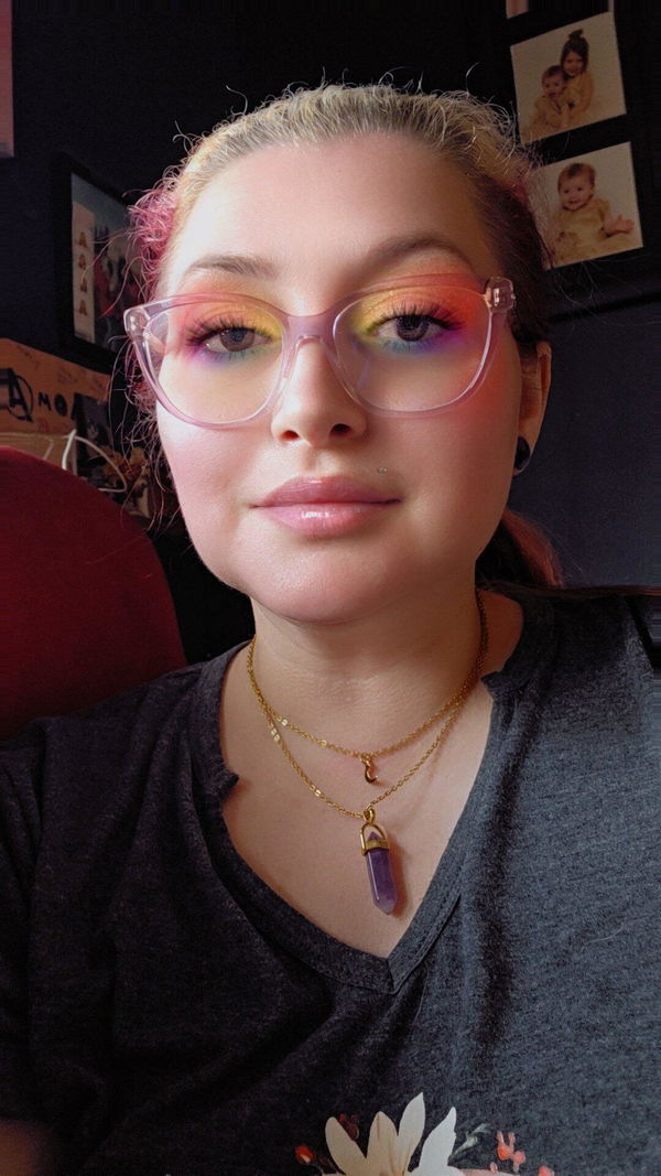 Customer photo: Kara wearing her purple aura crystal necklace