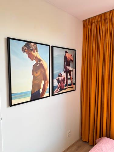 Two Garçon à la Plage canvases hung side by side in a customer's room