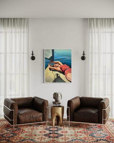 Sur le Bateau canvas hanging between two wall lights in a customer's living room