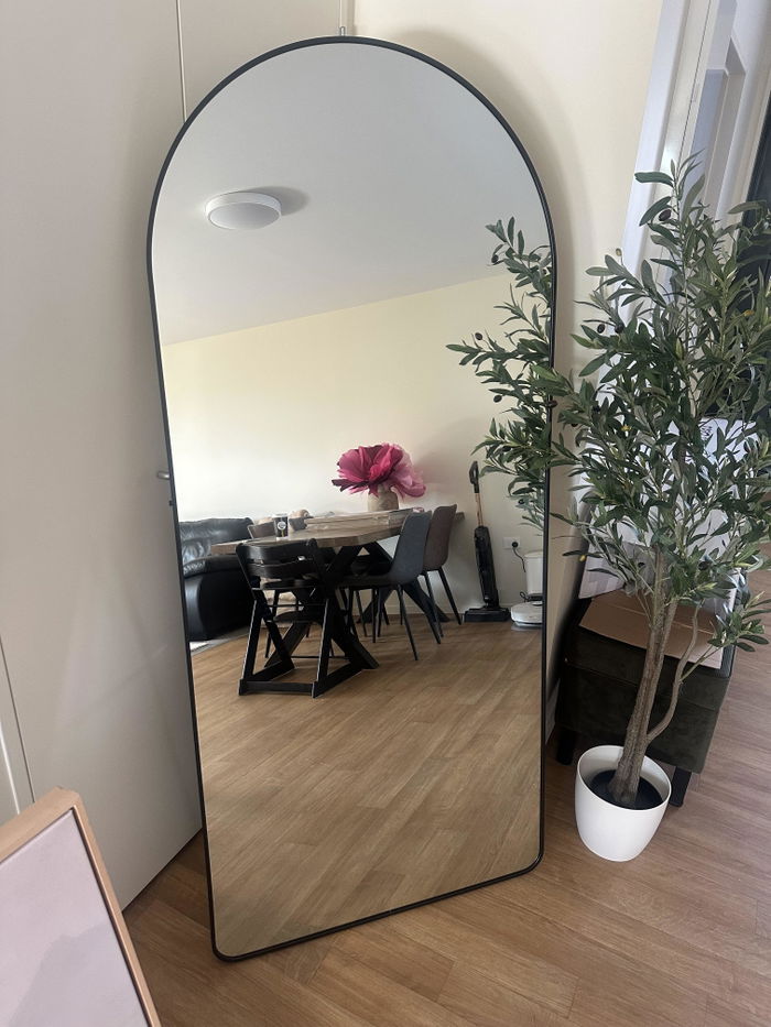 Svelte X Arched Full-Length Mirror in a customer's home