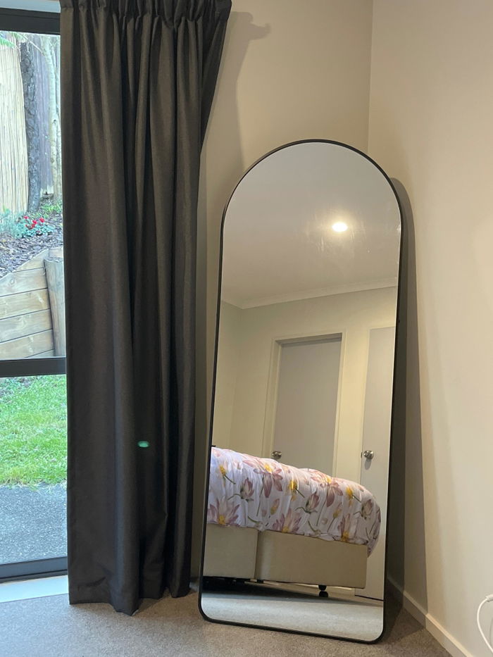 Svelte X Arched Full-Length Mirror in a customer's home