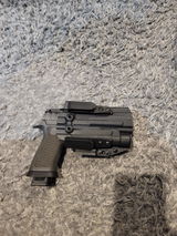 M. review photo
