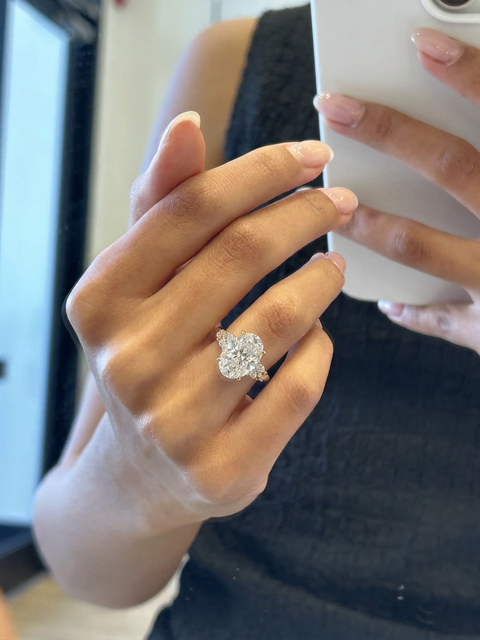 IGI Certified 5 - 7 Carat Oval Cut Diamond Ring in Cluster Setting