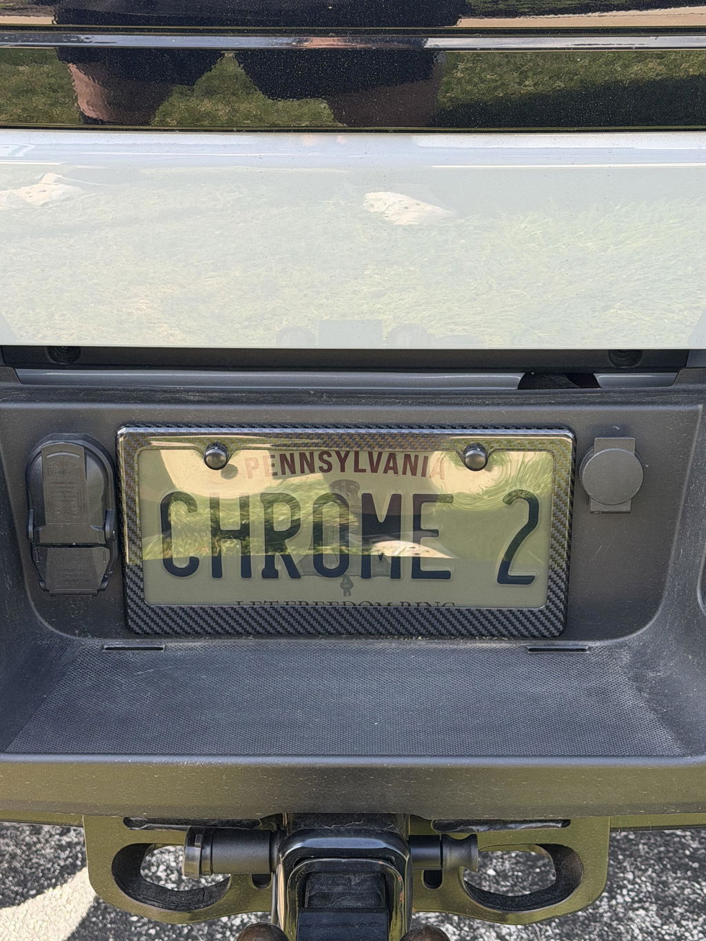 Carbon Fiber License Plate Frame - 2 Holes Wide Bottom - Gloss Finish