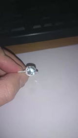 Aretes Estrella con Topacio Sky Blue en Plata 925 y Baño de Oro Blanco de 18 kt.