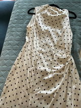 TL M. review photo