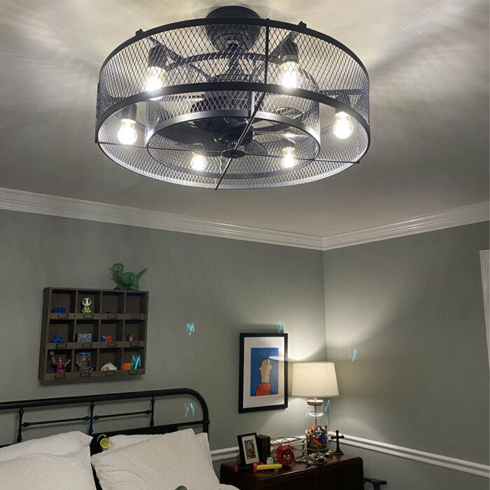 Customer-installed 26-inch caged ceiling fan in a bedroom