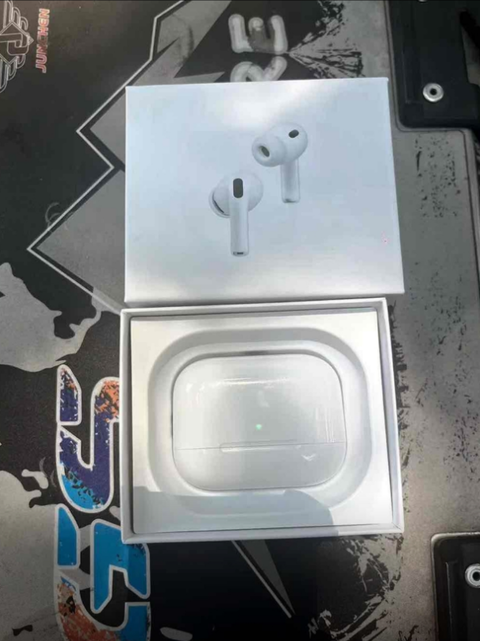 Customer photo showing DOGDAD TECH earbuds paired with a phone