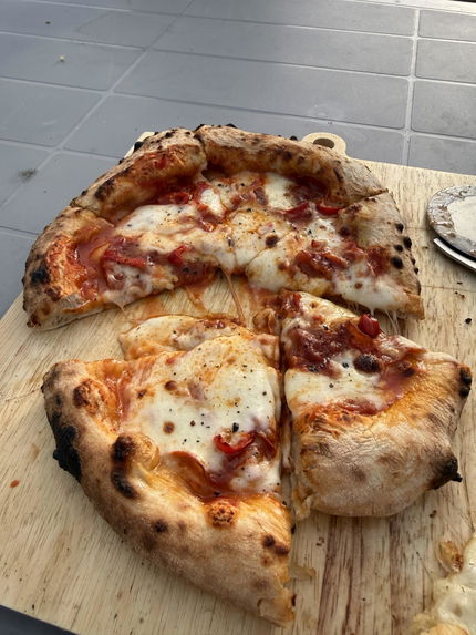 Pizza made by a Dough Dorks customer
