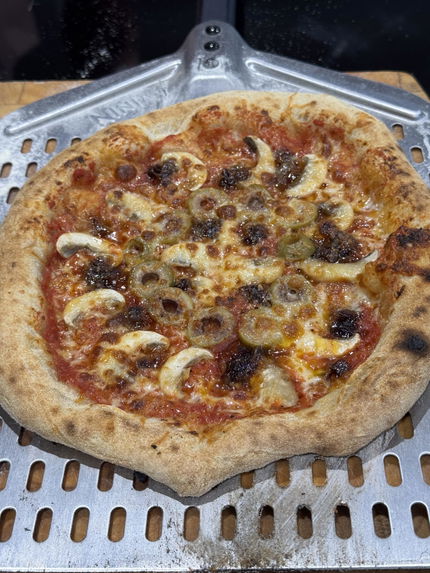 Pizza made by a Dough Dorks customer