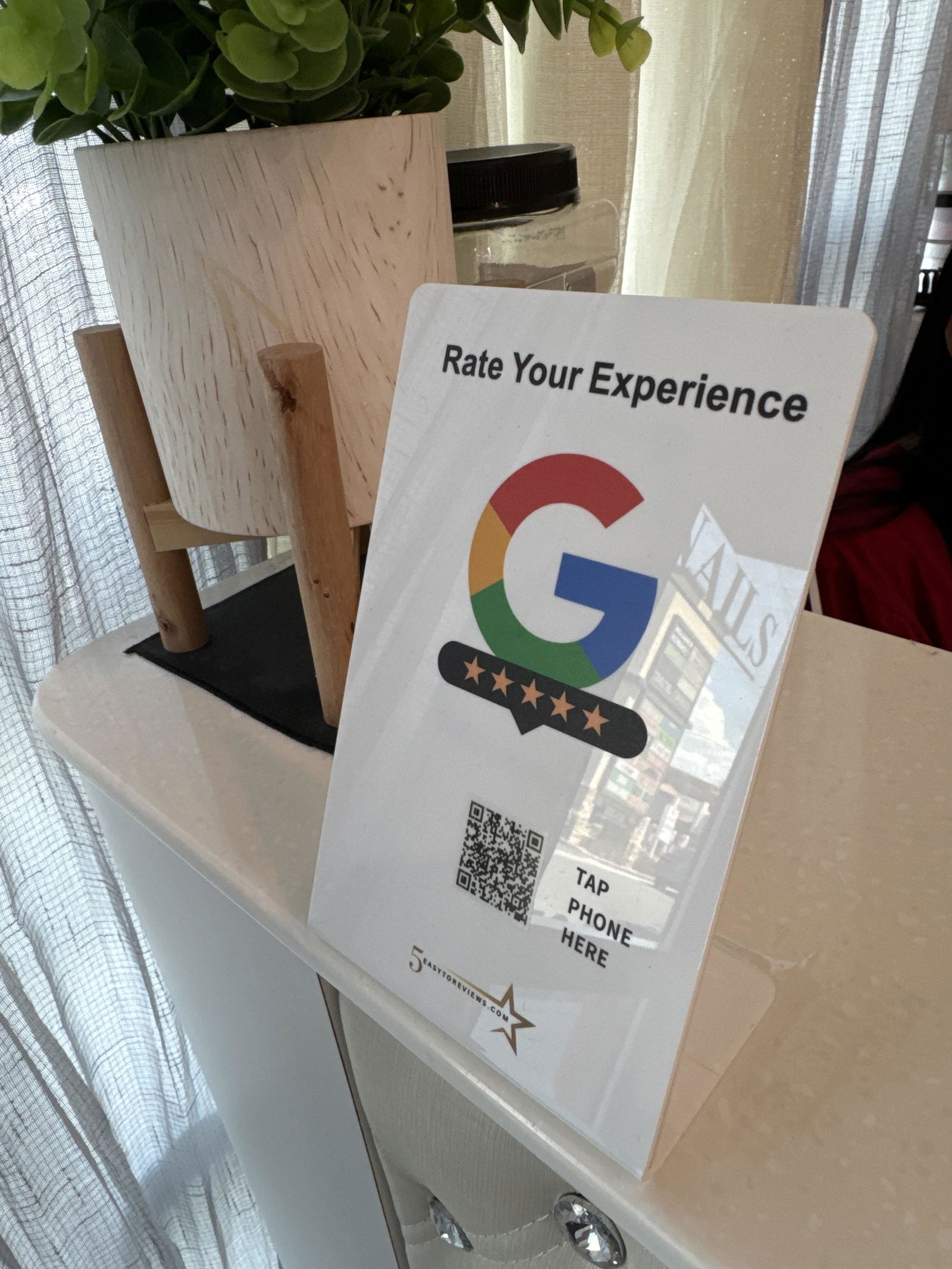 Tj's salon using Easy To Reviews NFC stand