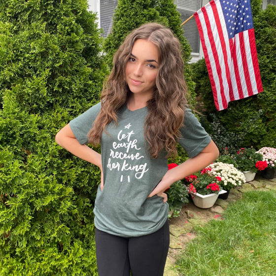 Customer photo of Let Earth Receive Her King Unisex Shirt from Andreea Popa