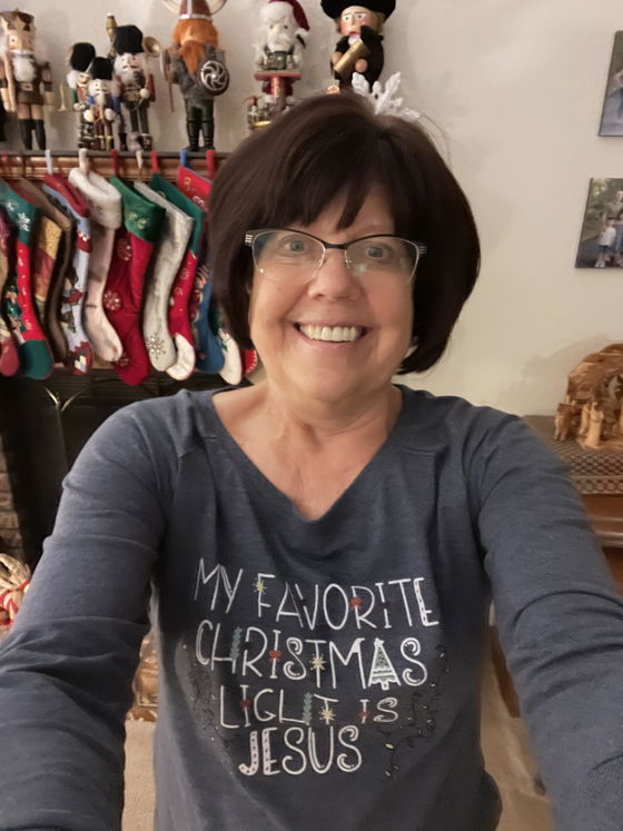 Customer photo of My Favorite Christmas Light is Jesus Multicolor Tunic Tee from Carla Slayden