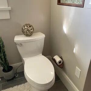 Customer photo of the LEAF wooden toilet paper holder