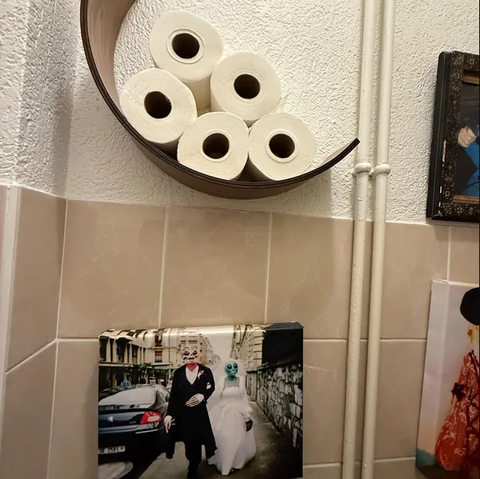 Customer photo of a minimalist wooden toilet paper holder