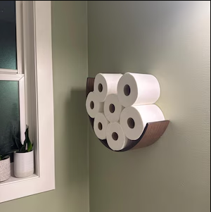 Customer photo of a wooden floating toilet roll holder in a powder room