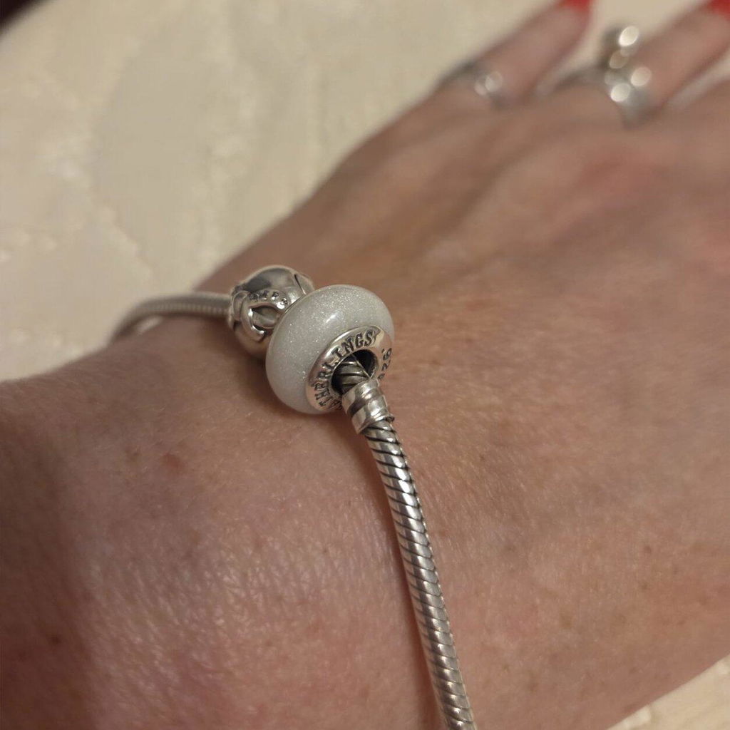 Round Ashes Charm