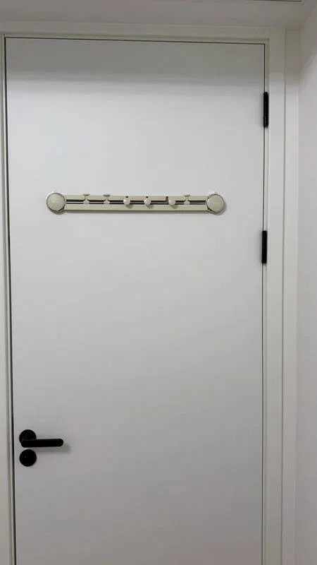 A renter's entryway with a jacket on the hook