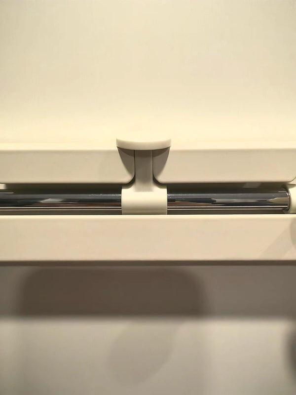 A renter's entryway with the hook and tray in place