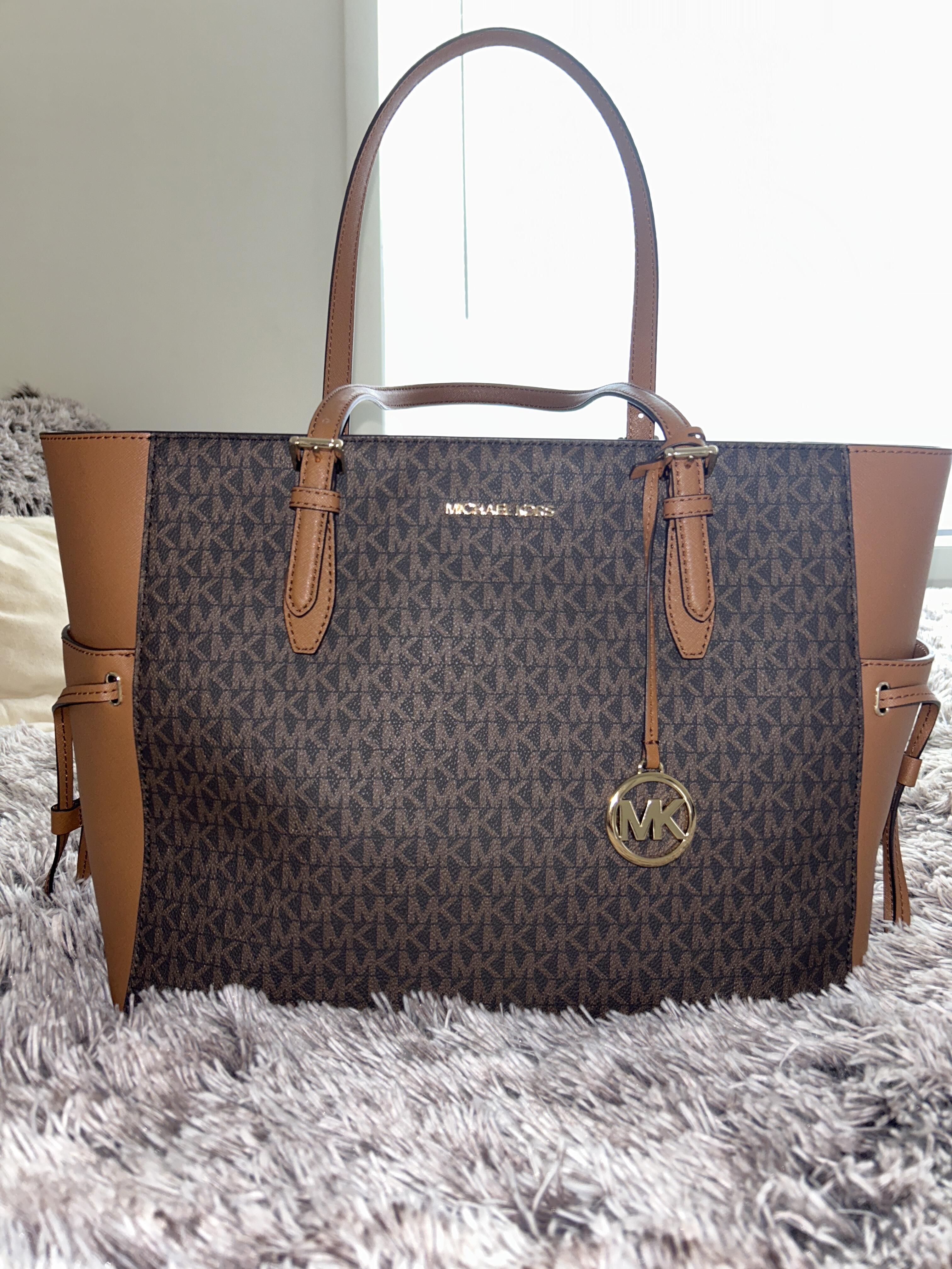 Customer photo for Michael Kors Gilly Large Jet Set Travel Drawstring Tote Brown MK Signature