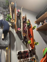 Skateboard wall storage rack