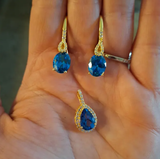 Classic Teardrop Shaped London Blue Topaz Halo Diamond Dangle Pendant
