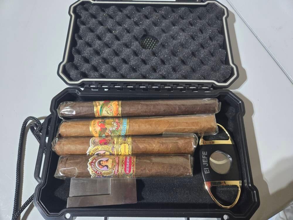 Customer photo of the Humidor To Go Cigar Set personalized gift from Groovy Guy Gifts, shared in a five star review by Jamell P.
