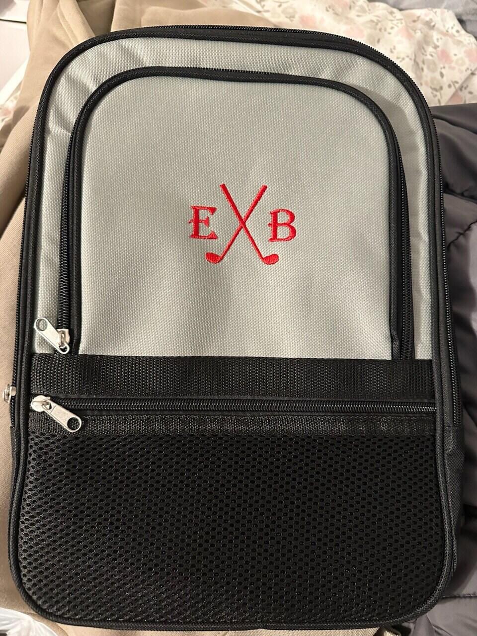 Customer photo of the Sunday Spike Personalized Golf Shoe Bag personalized gift from Groovy Guy Gifts, shared in a five star review by Breana D.