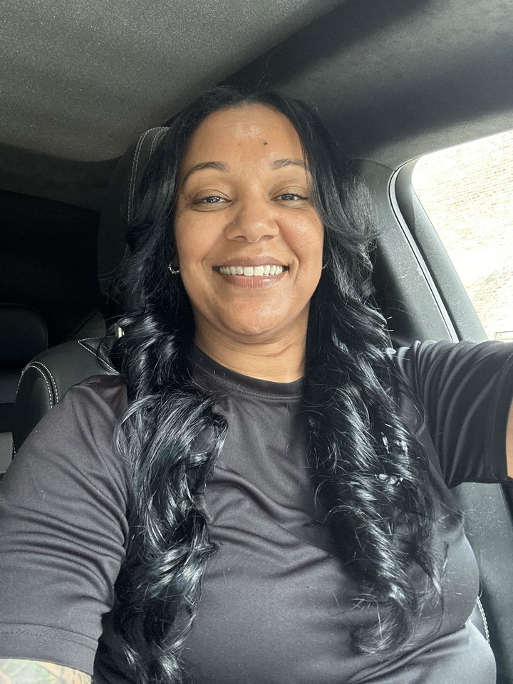 Customer photo attached to a verified purchase review of Brazilian Body Wave Hair 3 Bundle Deal