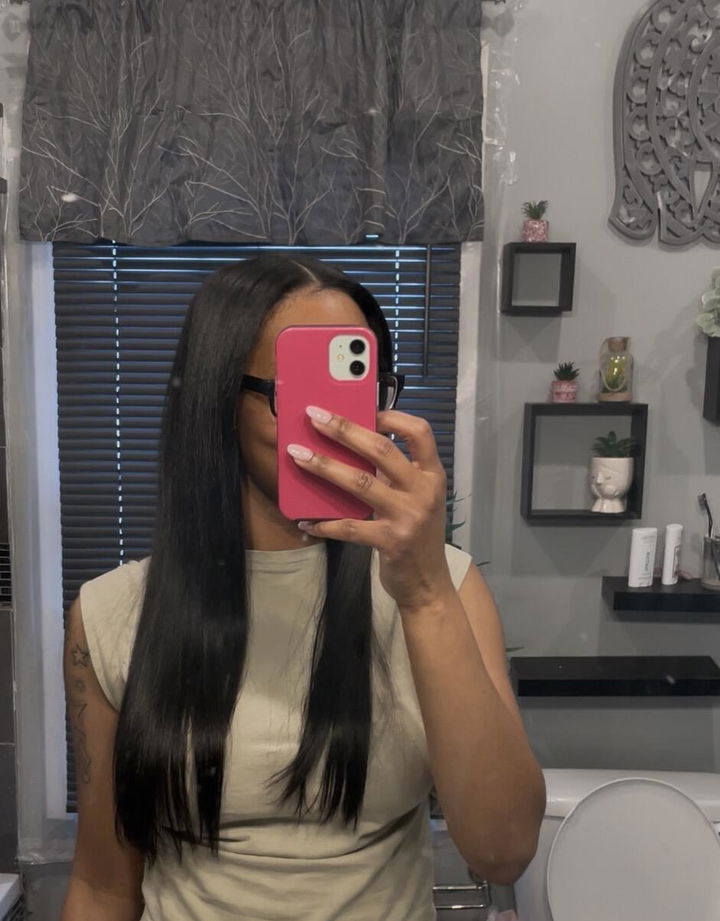 Customer photo attached to a verified purchase review of Brazilian Clip Ins