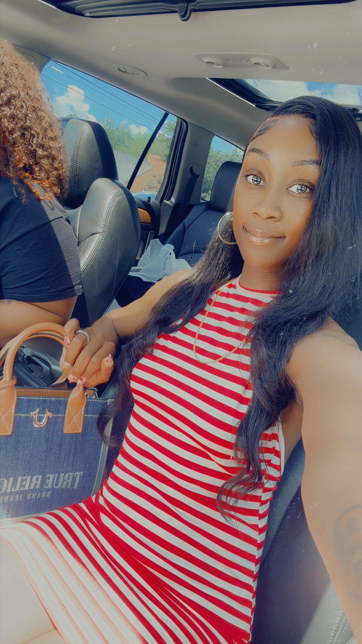 Customer photo attached to a verified purchase review of Brazilian Body Wave Hair 3 Bundle Deal
