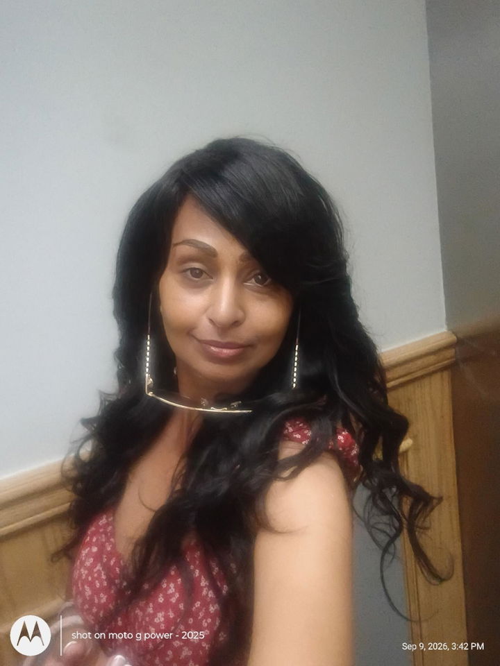 Customer photo attached to a verified purchase review of Brazilian Body Wave Hair 3 Bundle Deal