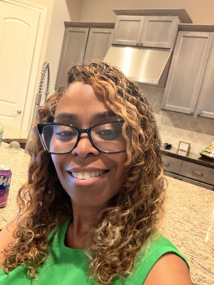 Customer photo attached to a verified purchase review of Brazilian Deep Curly Hair (1 Bundle)