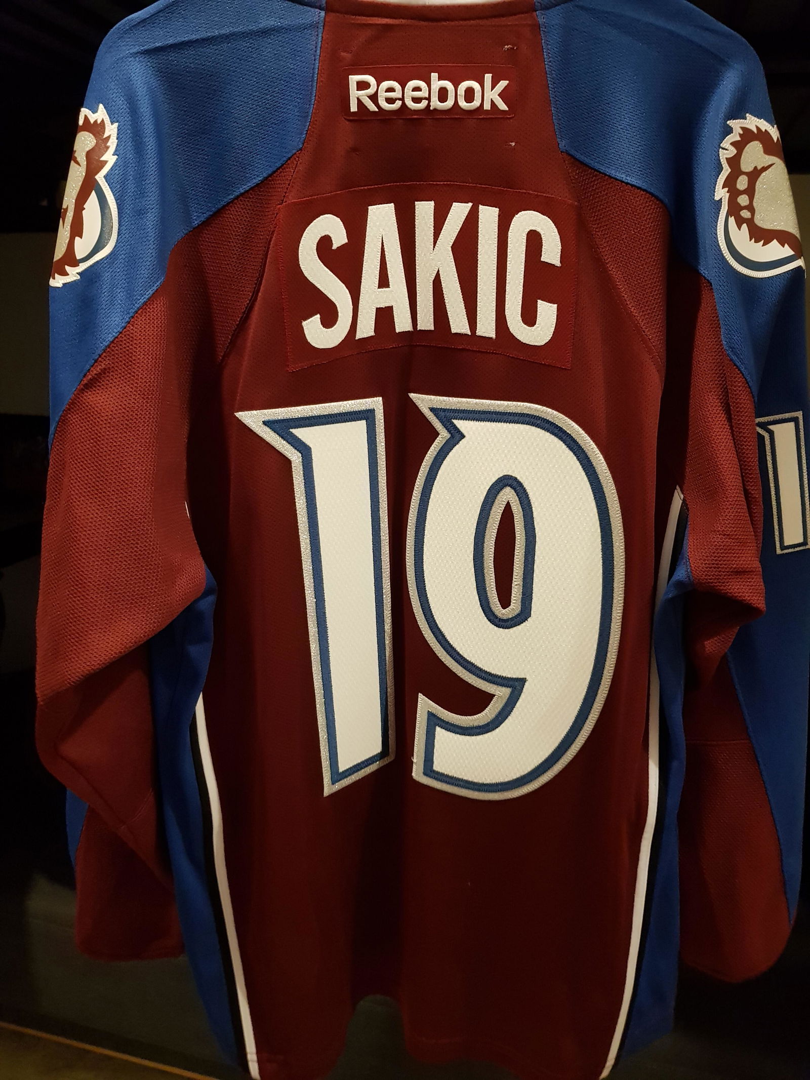 JOE SAKIC COLORADO AVALANCHE HOME PREMIER REEBOK NHL JERSEY