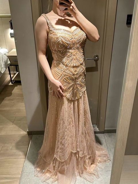 Elegant Beaded Evening Gown with Ruffled Hem and Intricate Detailing SS552