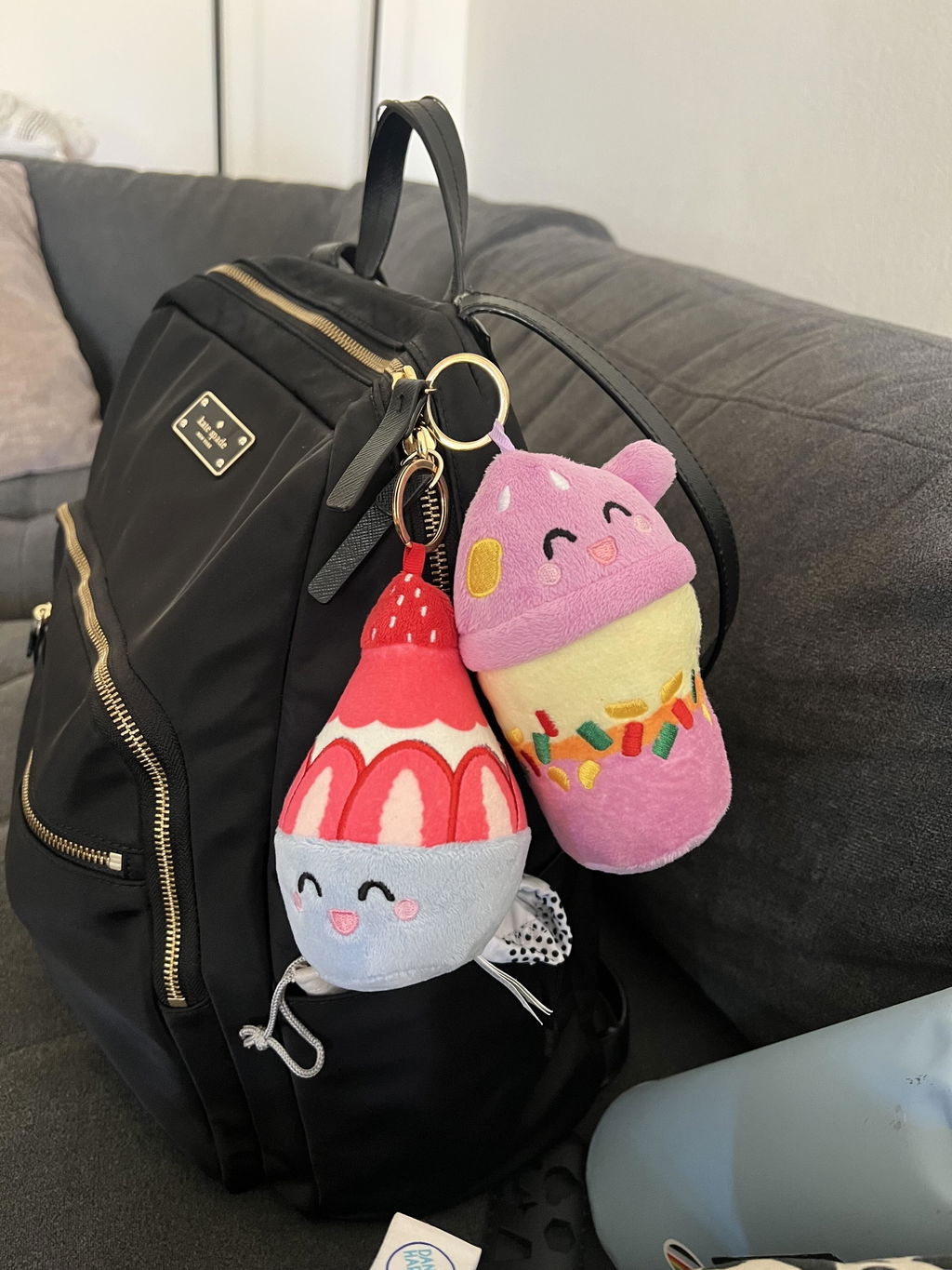 Andrea’s Halo-Halo and Bingsu Food Pals clipped to a family diaper bag