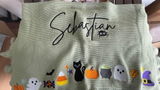 Hand Embroidered Halloween Name Baby Blanket | Ruffle Edge Custom Knit Heirloom Blanket