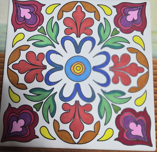 Painted ceramic tile from a review