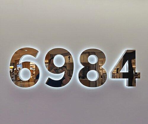 Backlit LED Stainless Steel Address Numbers - Modern Lighted House Signs in Brushed Silver Texture