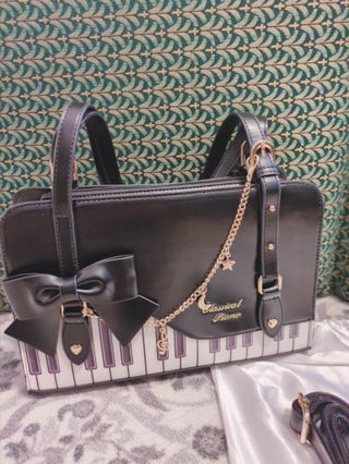 Customer photo for Piano Waltz Bowknot Sweet Lolita Handbag