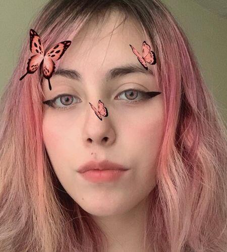 Customer photo wearing Fantastic Baby Kitty Pink Colored Contact Lenses
