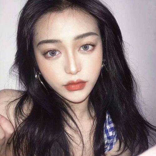 Customer photo wearing DNA Taylor Blue Gray Wildcat Blue Prescription Colored Contact Lenses
