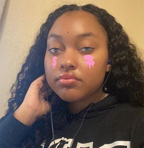 Customer photo wearing DNA Taylor Blue Gray Wildcat Blue Prescription Colored Contact Lenses